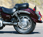 Like the Suzuki, the Kawasaki uses shaft final drive, which is heavier and creates more drivetrain lash than a belt. Some see it as more reliable, though.